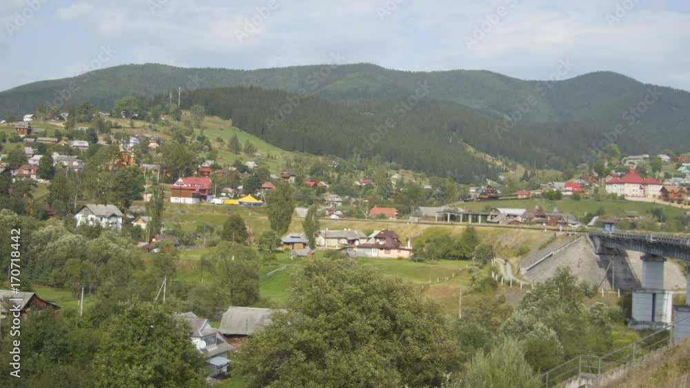 Beautiful mountain views: village, road and river Beautiful mountain views: village, road and river