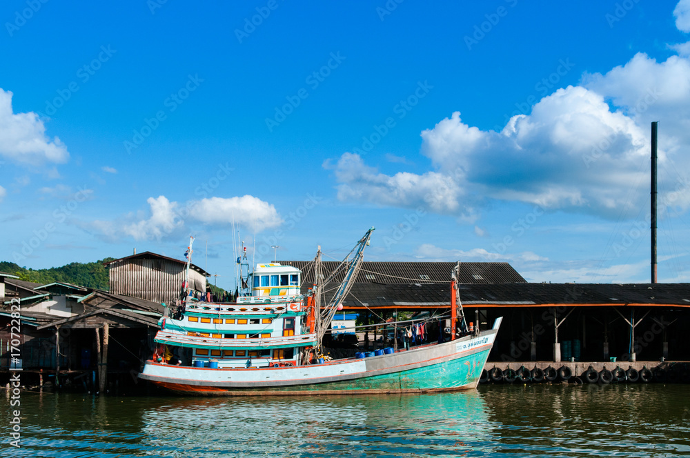 Fototapeta premium Old fishing boats in river