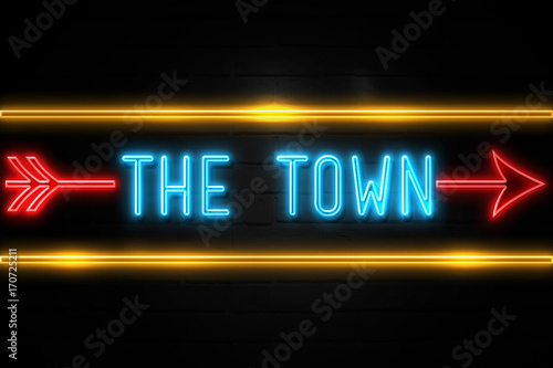 The Town - fluorescent Neon Sign on brickwall Front view
