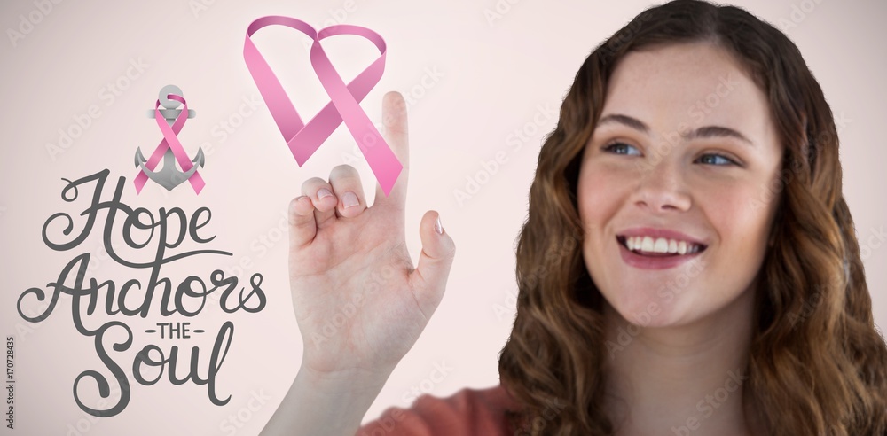 Composite image of beautiful happy young woman pointing Composite image of beautiful happy young woman pointing