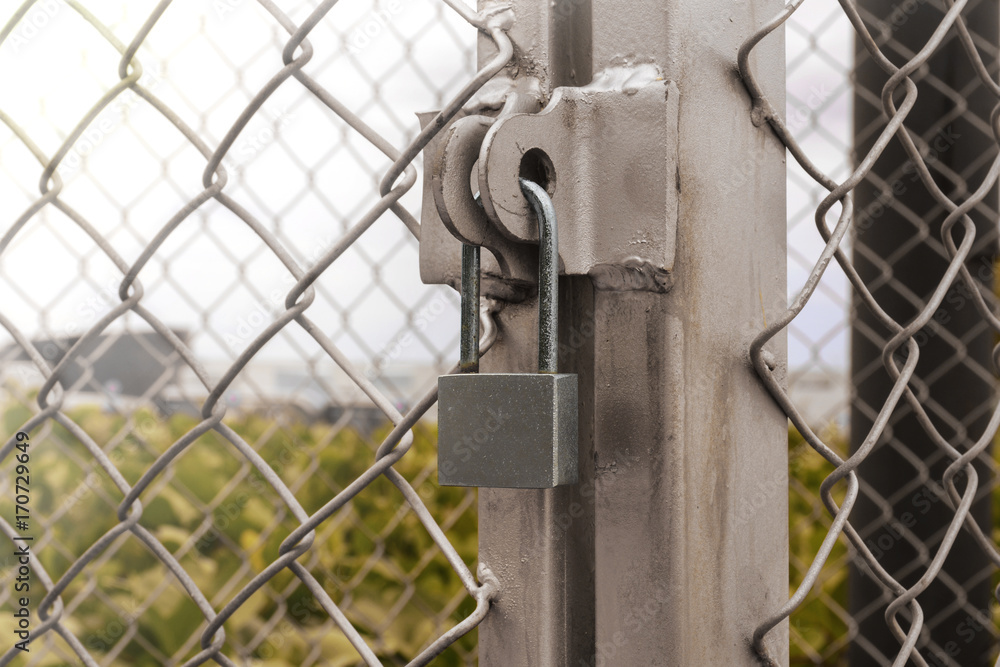 The net metal and padlock The net metal and padlock
