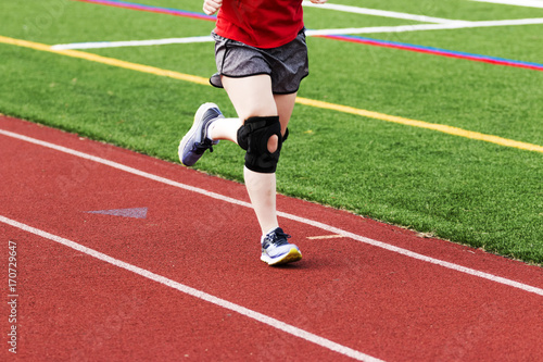 Running with a knee brace on