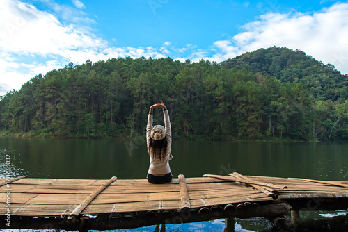 Women are siting on the terrace at resort on enjoy and relax with the outside nature, Meahongsorn Thailand.  Lifestyle and travel Concept photo