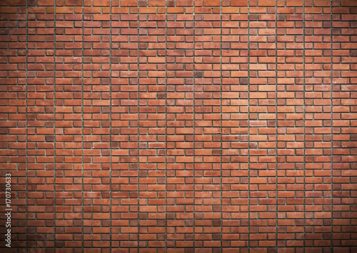 red brick wall texture grunge background with vignetted corners, may use to interior design