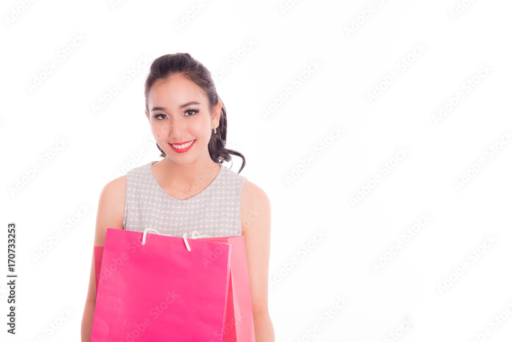 Cheerful shopping woman of Asian holding bags. Shopping smart business woman happy smiling holding colorful shopping bags isolated on white . Fresh young Asian female model in studio. Cheerful shopping woman of Asian holding bags. Shopping smart business woman happy smiling holding colorful shopping bags isolated on white . Fresh young Asian female model in studio.