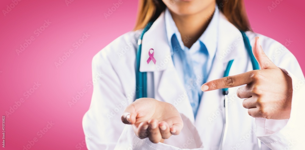 Composite image of mid section of female doctor showing empty Composite image of mid section of female doctor showing empty