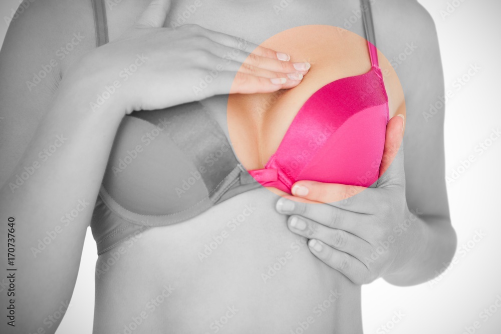 custom made wallpaper toronto digitalMid section of woman in pink bra checking breast for cancer