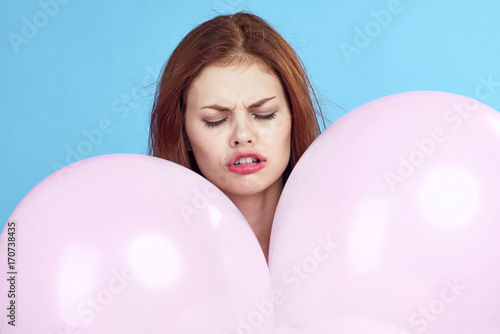 young woman, pink balloons, portrait, emotions