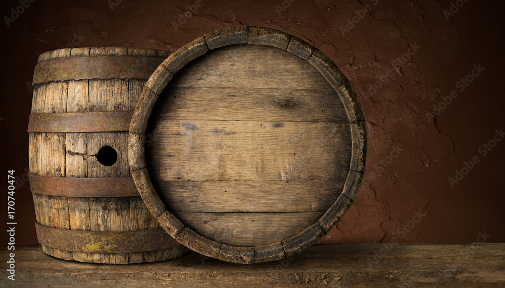 Old Wooden Beer Barrel on the Dark Background