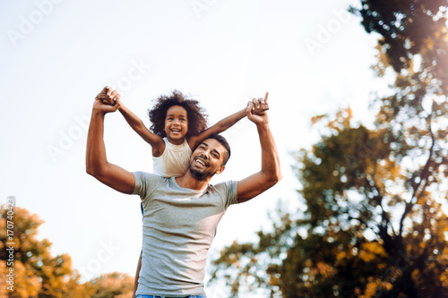 Happy father and child spending time outdoors