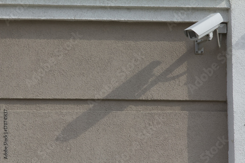 Big CCTV Camera on the wall of building - telephoto