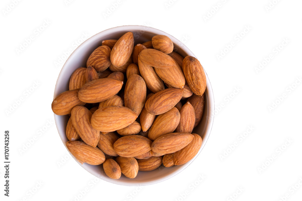 White ceramic bowl with almond isolated on white background White ceramic bowl with almond isolated on white background