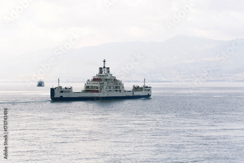 Ship in Strait of Messina, Mediterranean Sea, Italy, Calabria   © giftulya