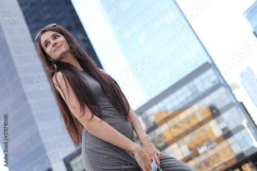 young fashionable girl in the cityscape