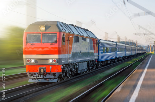 Passenger diesel train traveling speed railway wagons journey light