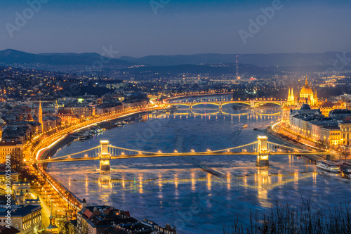 Aerial view of Budapest at night. Hungarian landmarks: Chain Bridge, Parliament and Danube river in Budapest.