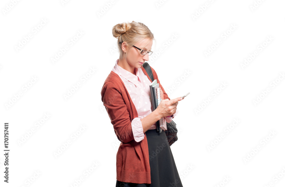 Young student girl using smart phone.. Back to school Young student girl using smart phone.. Back to school