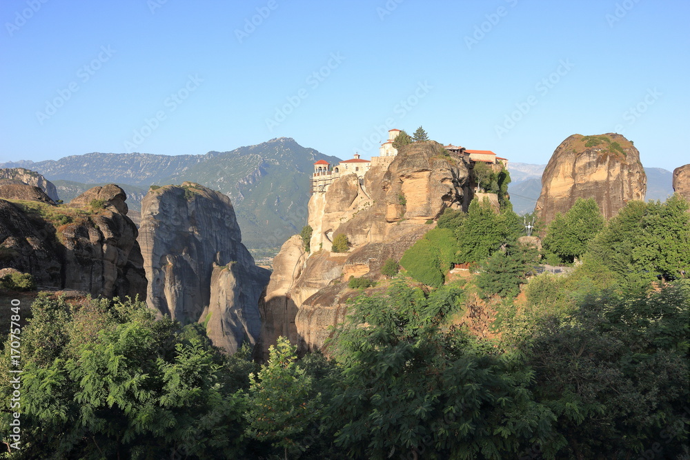 Beautiful landscape of Meteora at sunrise. Monastery of Varlaam. Central Greece.