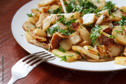 Fried potatoes with bacon and parsley III