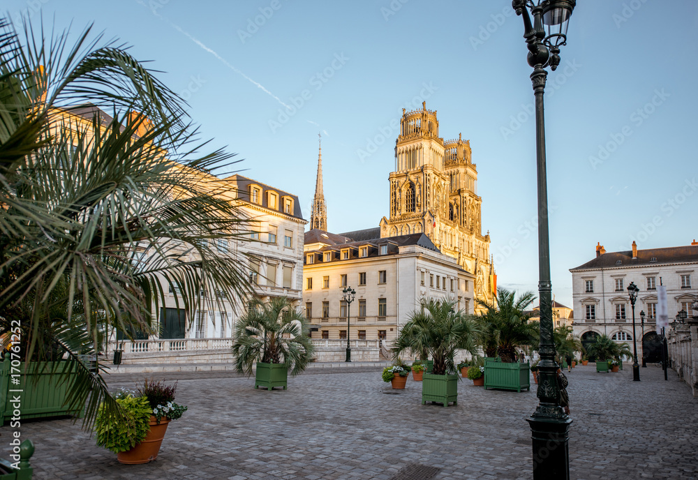 Fototapeta premium Sunset view on the old town with saint Croix cathedral in Orleans city in France