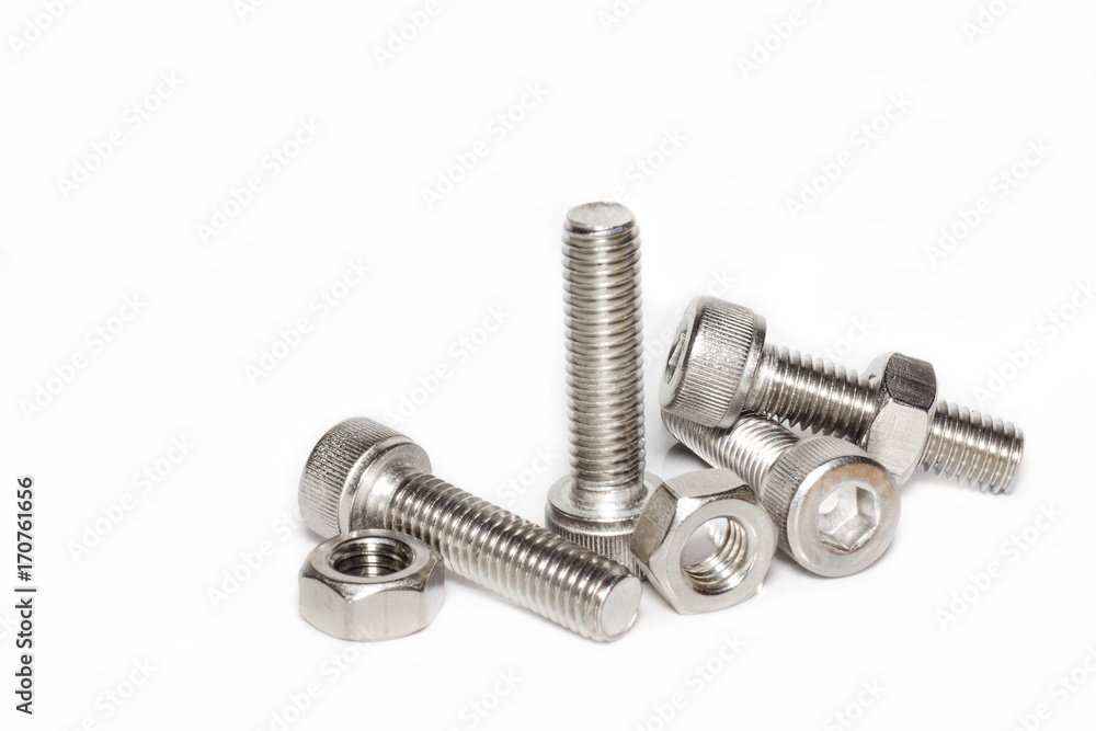 Steel nut and bolt on white background. Steel nut and bolt on white background.