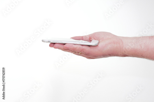 Smartphone in hand, bezel less modern design. white version