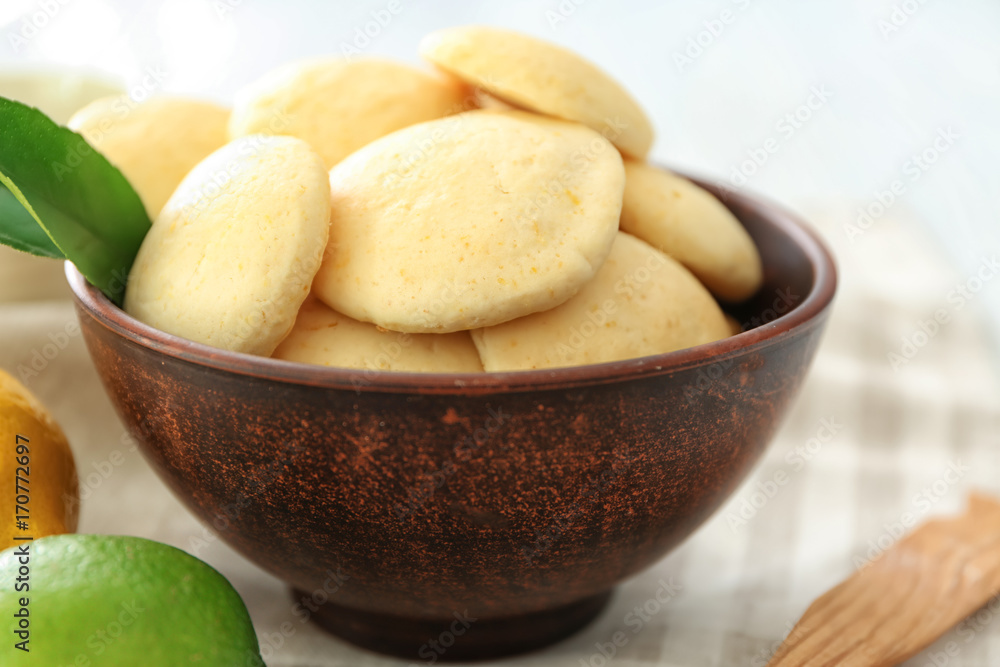 Bowl with tasty homemade lemon cookies on table Bowl with tasty homemade lemon cookies on table