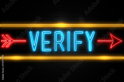 Verify - fluorescent Neon Sign on brickwall Front view
