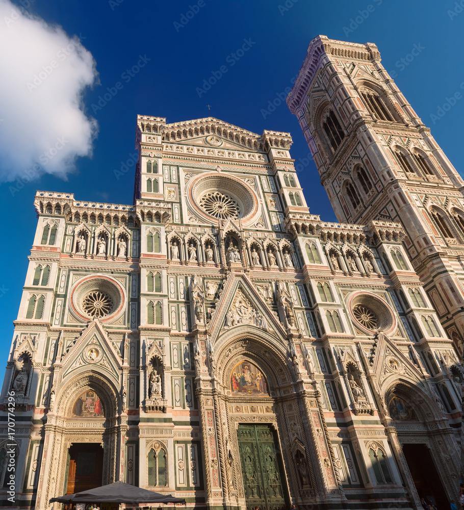 Facade of famous religious and art monument - Duomo Santa Maria Del Fiore and Campanile. Florence, Italy
