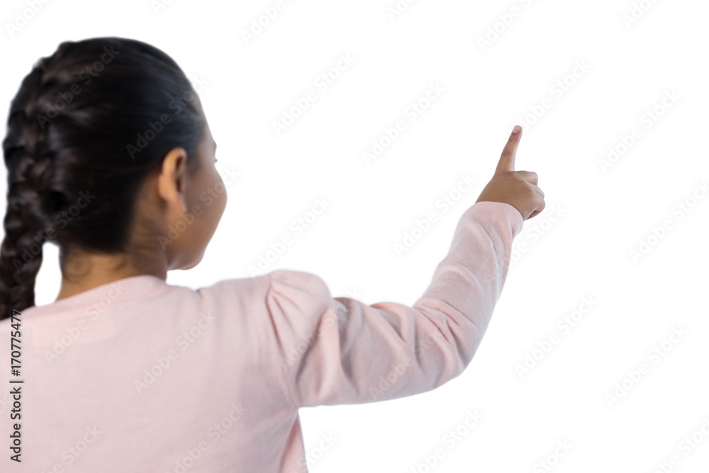 Girl pressing an invisible virtual screen Girl pressing an invisible virtual screen