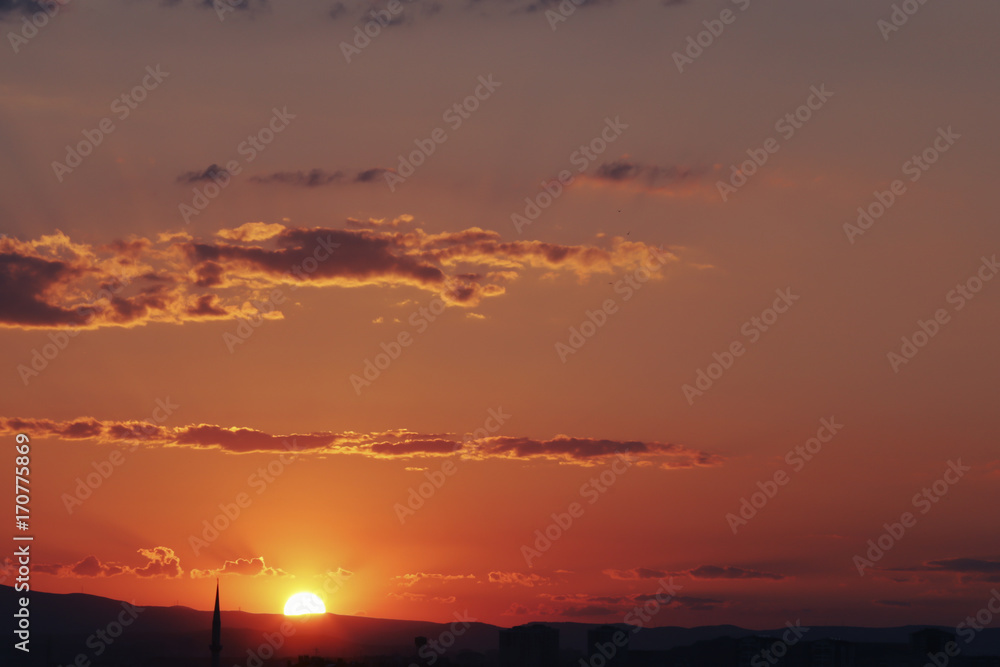 Sunset over Ankara Turkey skies. beautiful landscape with a red sunset sky over the field 