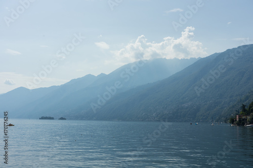 Lago Maggiore Lake with fog and Mountain landscape in Ascona Switzerland