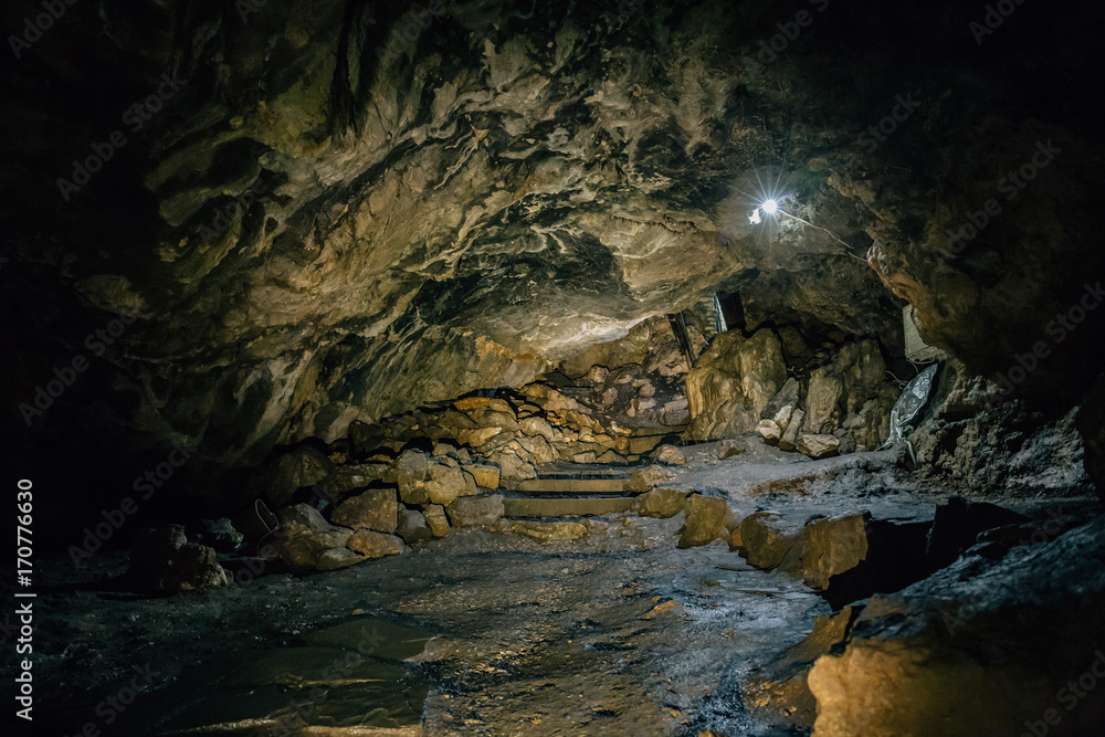 Tunnel inside a large underground cave