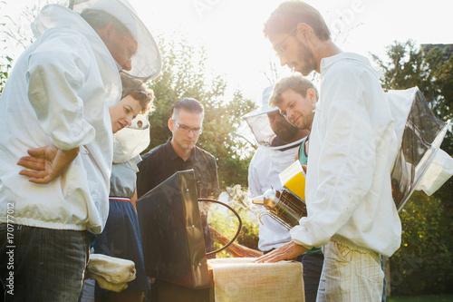 Apiculture Workshop - Beekeeping Students With Teacher Around Beebox photo