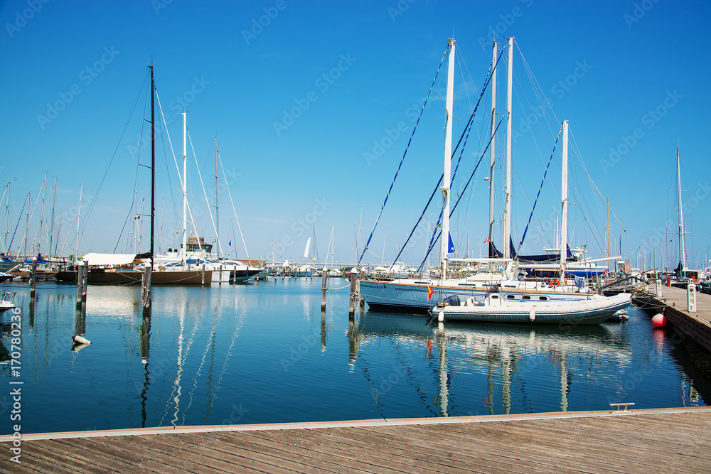 Fototapeta premium Yachts in the port waiting.
