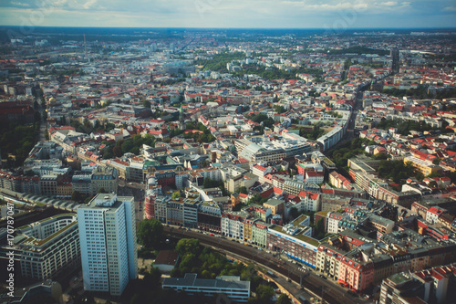 Aerial view of Berlin with skyline and scenery beyond the city, Germany, seen from the observation deck of TV tower photo