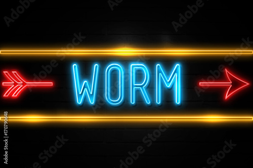 Worm - fluorescent Neon Sign on brickwall Front view
