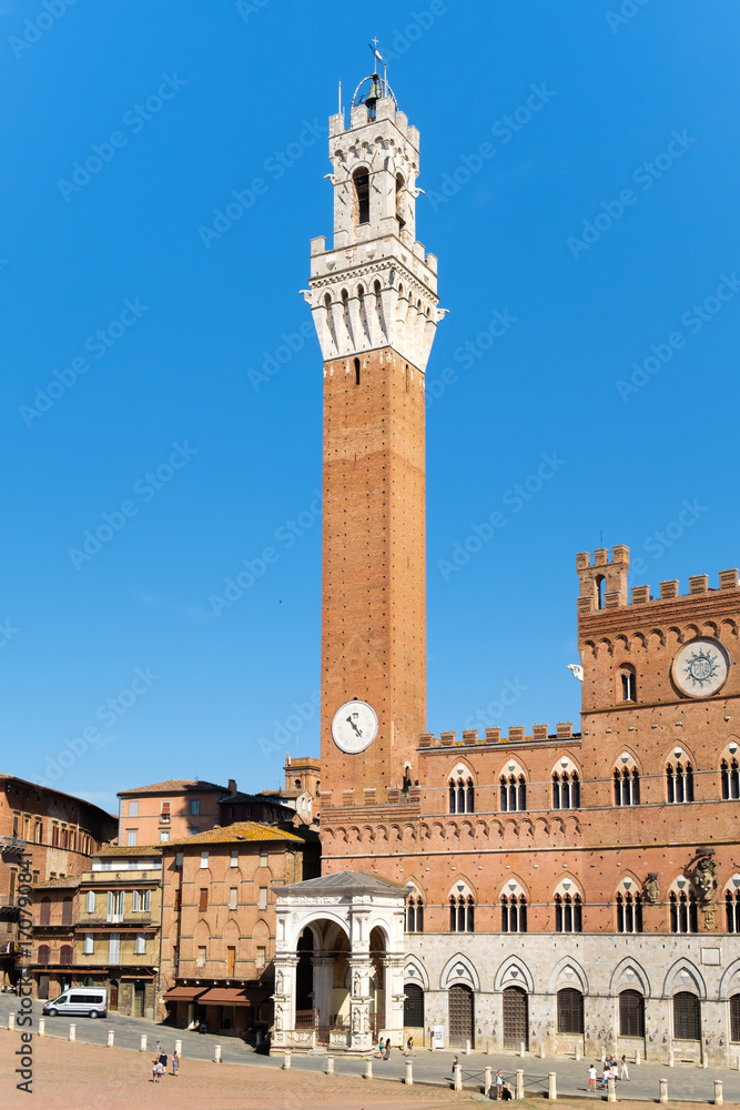 The Palazzo Publico at Piazza del Campo on the city of Siena, Italy
