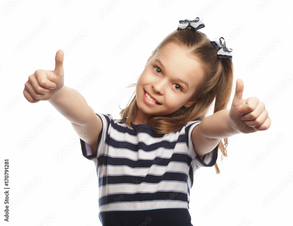 Happy cute little girl standing and showing thumbs up Happy cute little girl standing and showing thumbs up