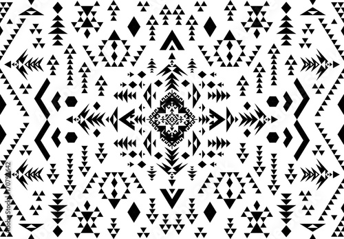 Ethnic pattern design. Seamless pattern. Navajo geometric print. Rustic decorative ornament. Abstract geometric pattern. Native American pattern. Black and white colors