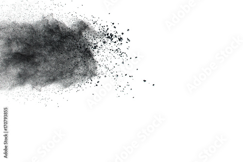 Black powder explosion against white background.