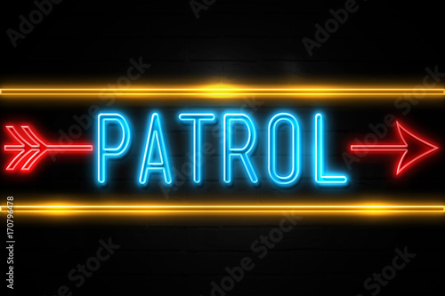 Patrol - fluorescent Neon Sign on brickwall Front view