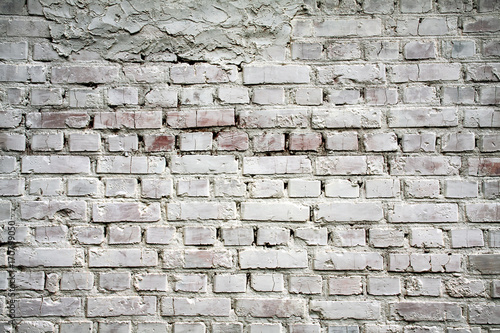 Old brick wall with white