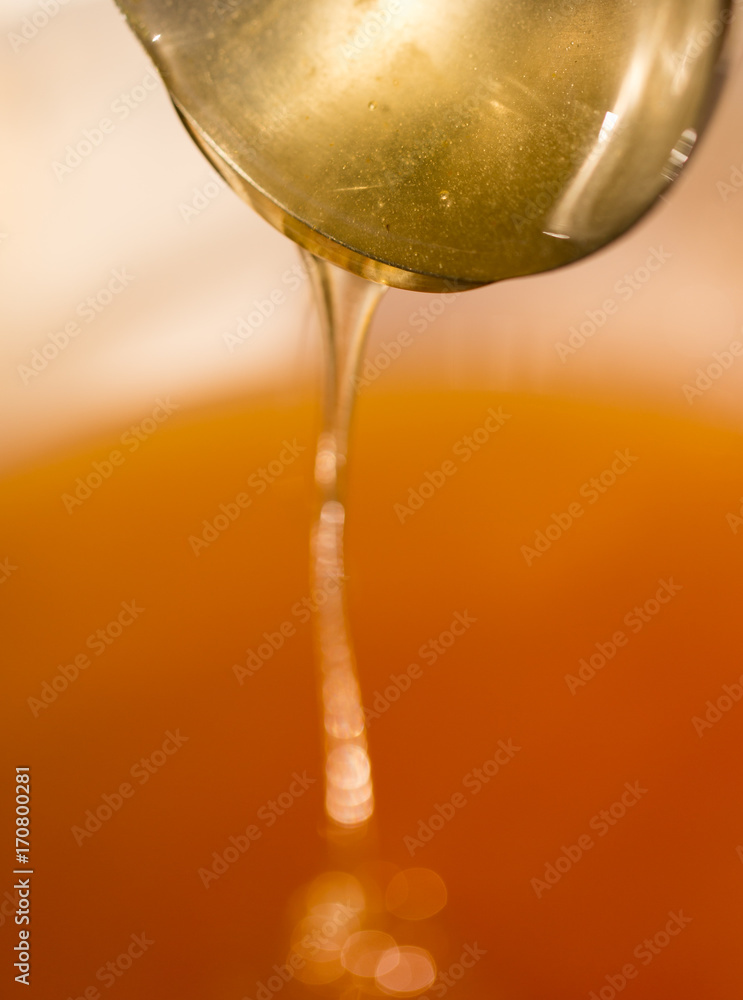 the beekeeper sells honey in the market