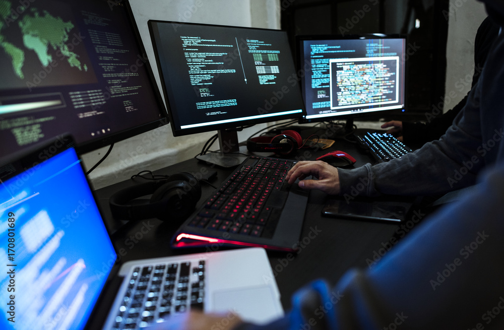 Hacker working on computer cyber crime Hacker working on computer cyber crime