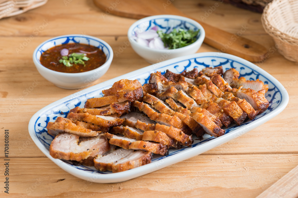 Deep Fried Crispy Pork Belly Cooked with Garlic and spicy dipping sauce Deep Fried Crispy Pork Belly Cooked with Garlic and spicy dipping sauce