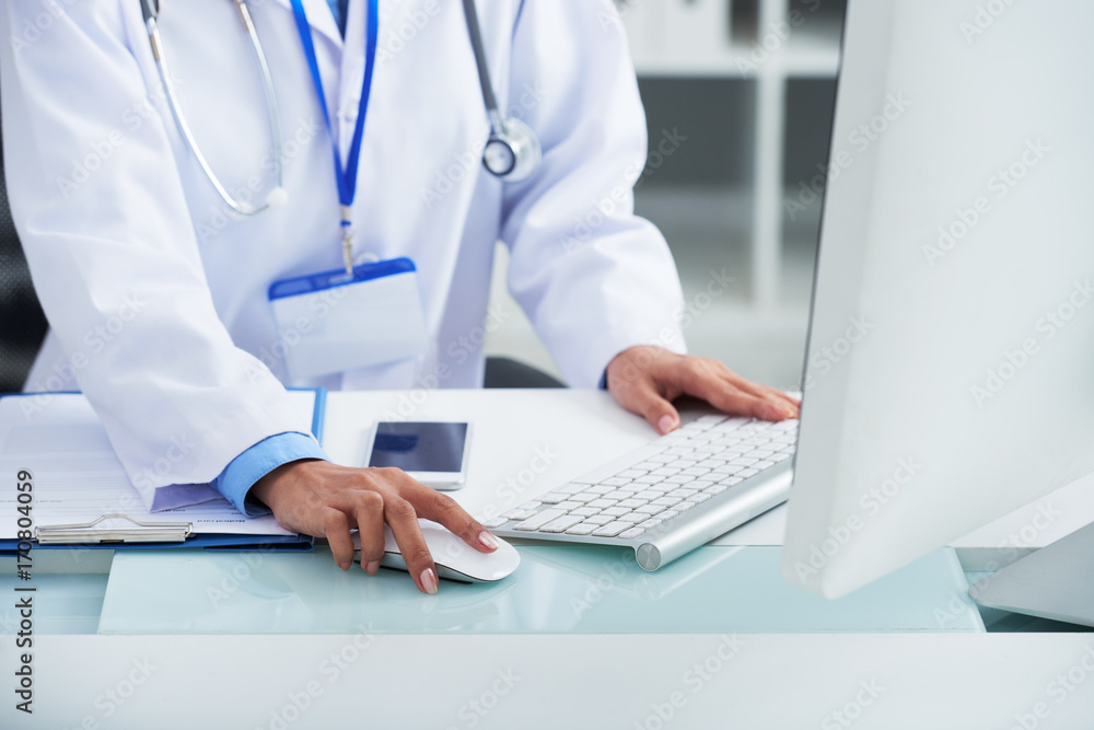 Doctor working on computer Doctor working on computer