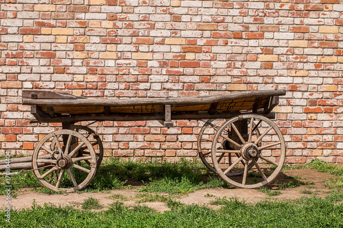 Old vintage wooden cart. Traditional wooden cart