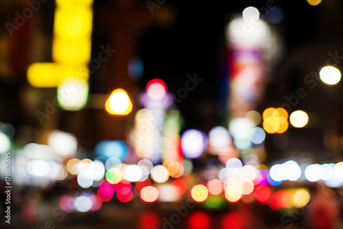 Blurred street bokeh lights at night time photo