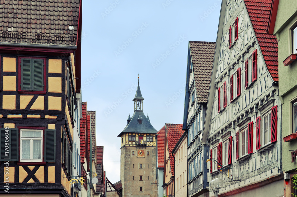 Old street of Marbach (Neckar) with half-timbered houses and tower, Baden-Wurttemberg, Germany. Old street of Marbach (Neckar) with half-timbered houses and tower, Baden-Wurttemberg, Germany.